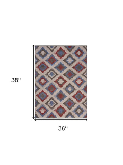 5' X 7' Red and Blue Geometric Diamonds Area Rug