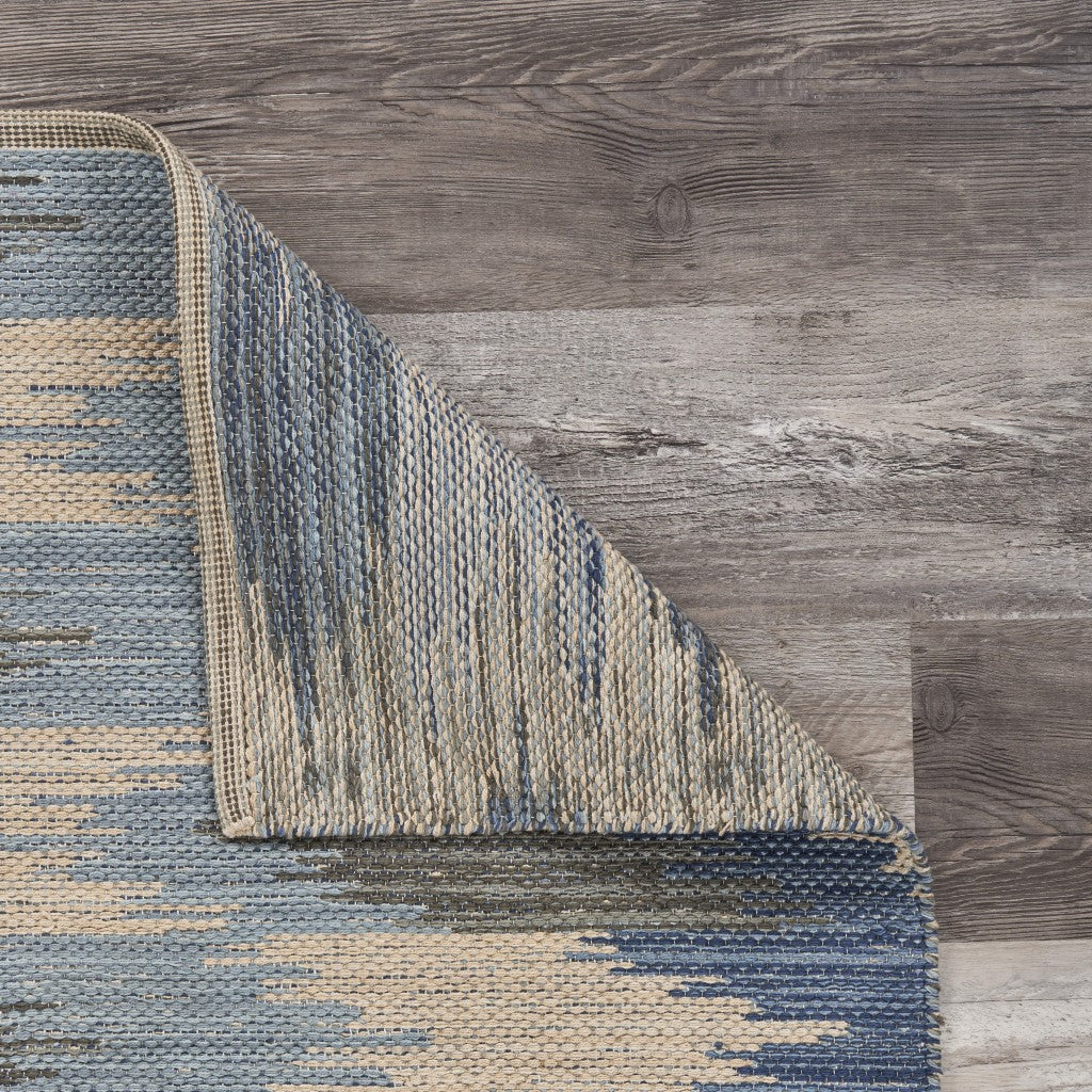 5' X 7' Blue and Cream Ikat Pattern Area Rug