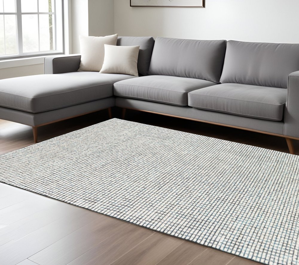 5' X 8' Ivory Wool Hand Loomed Area Rug