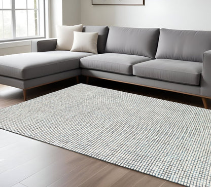 5' X 8' Ivory Wool Hand Loomed Area Rug