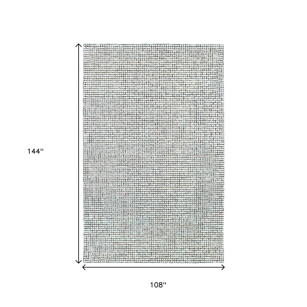 5' X 8' Ivory Wool Hand Loomed Area Rug