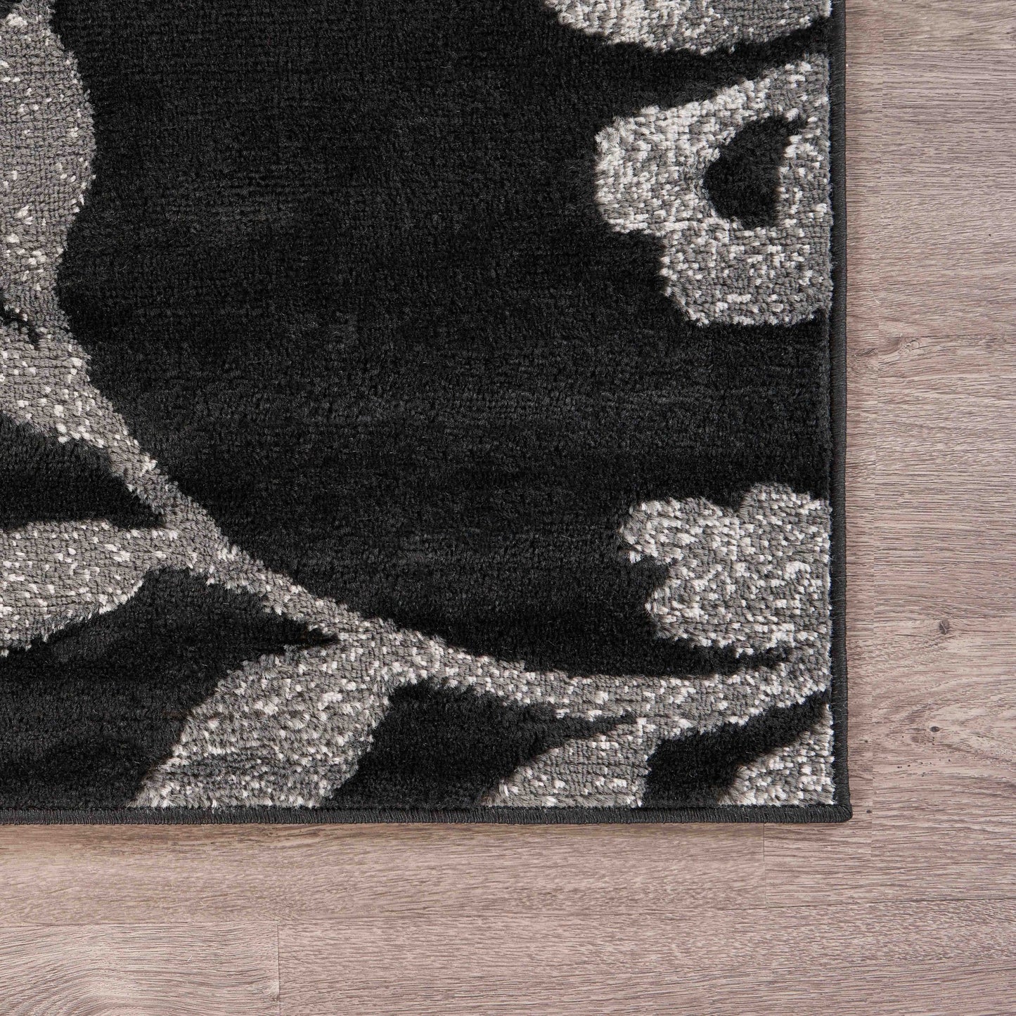 5' X 7' Black Gray and White Floral Vines Area Rug