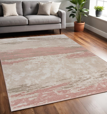 5' X 7' Ivory Beige and Blush Abstract Area Rug