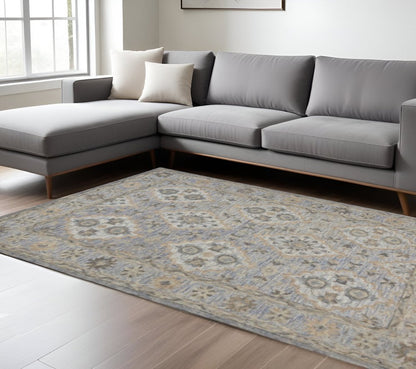 5' X 8' Blue and Tan Traditional Area Rug