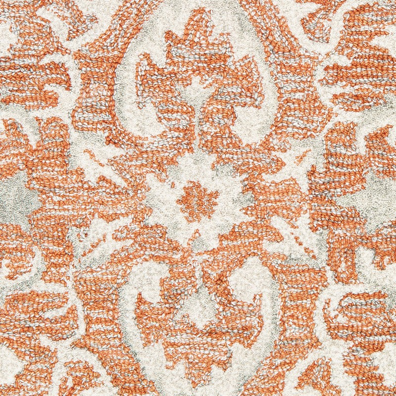 5' X 8' Orange and Ivory Medallion Area Rug