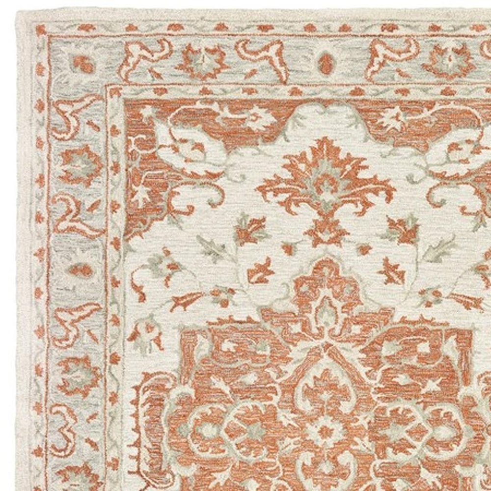9' X 12' Orange and Ivory Medallion Area Rug