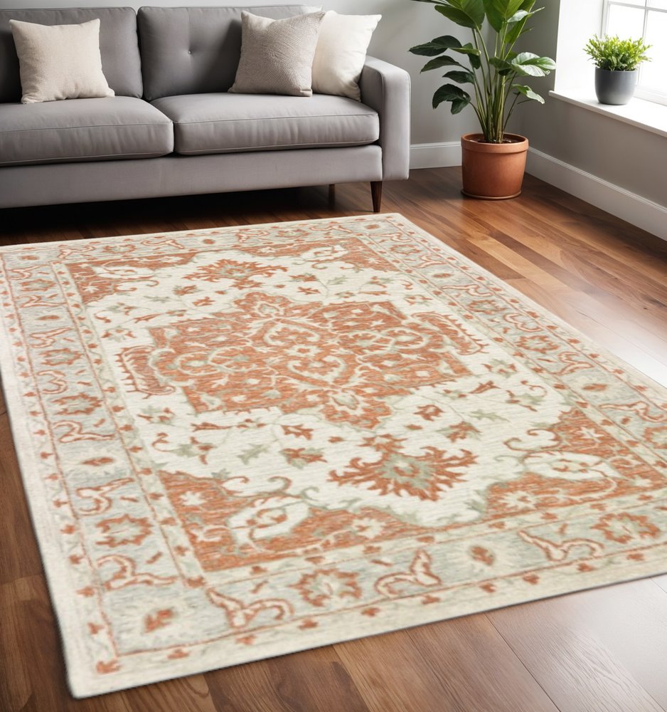 9' X 12' Orange and Ivory Medallion Area Rug