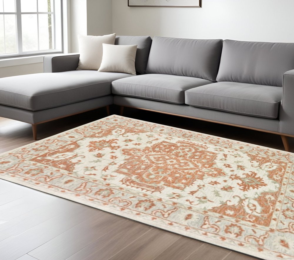 9' X 12' Orange and Ivory Medallion Area Rug