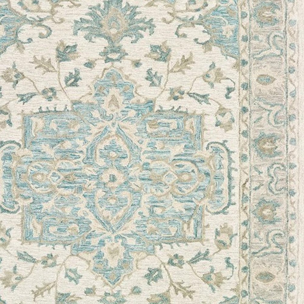 5' X 8' Turquoise and Cream Medallion Area Rug