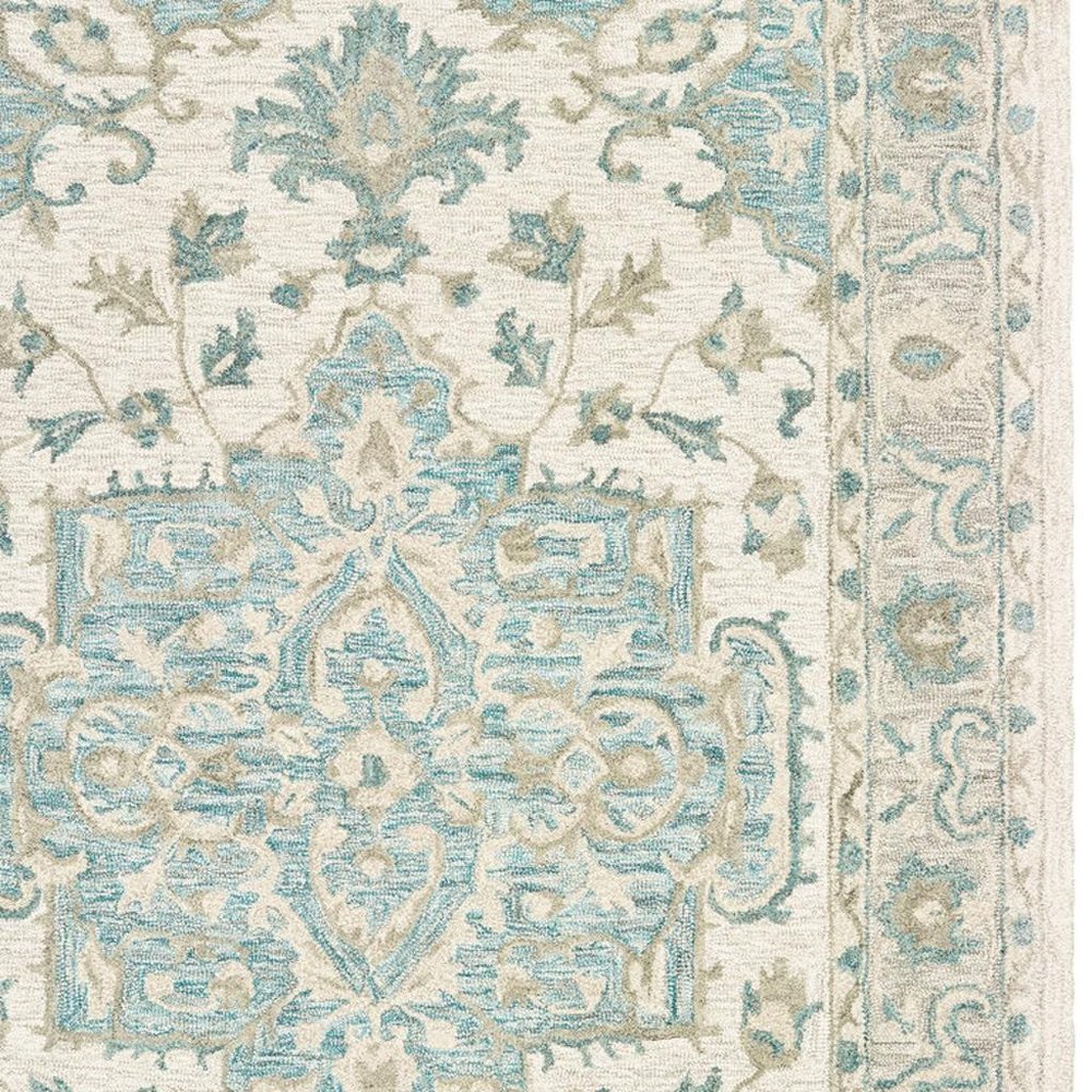 9' X 12' Turquoise and Cream Medallion Area Rug