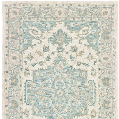 5' X 8' Turquoise and Cream Medallion Area Rug