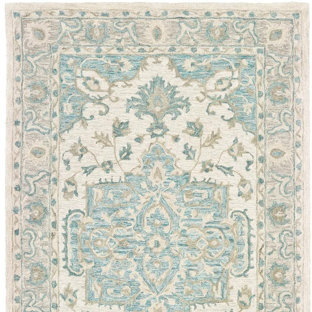5' X 8' Turquoise and Cream Medallion Area Rug