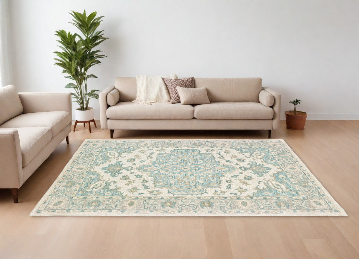 5' X 8' Turquoise and Cream Medallion Area Rug