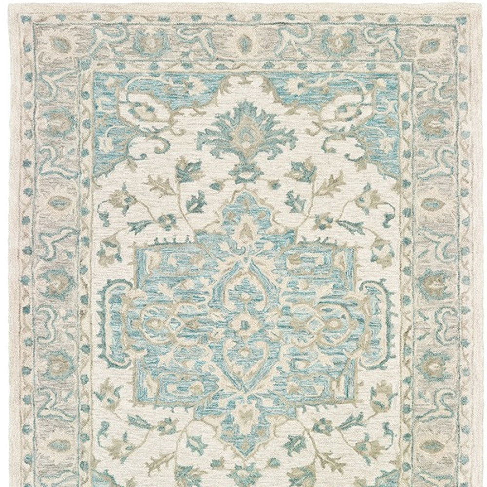 5' X 8' Turquoise and Cream Medallion Area Rug