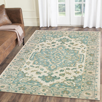 5' X 8' Turquoise and Cream Medallion Area Rug