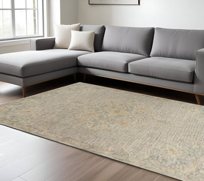 9' X 12' Beige Distressed Floral Area Rug
