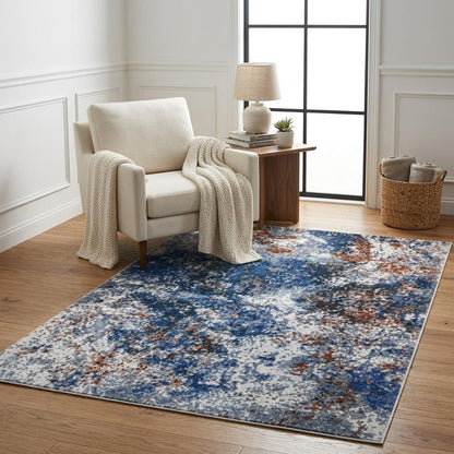 5' X 8' Blue and White Abstract Ocean Area Rug