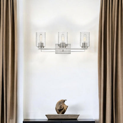 Silver Metal and Textured Glass Three Light Wall Sconce