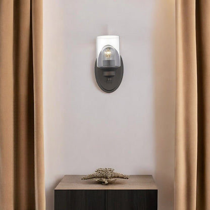 One Light Bronze Wall Light with Clear Glass Shade