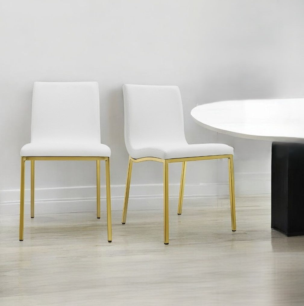 Set of Two Minimalist White Faux Faux Leather and Gold Chairs