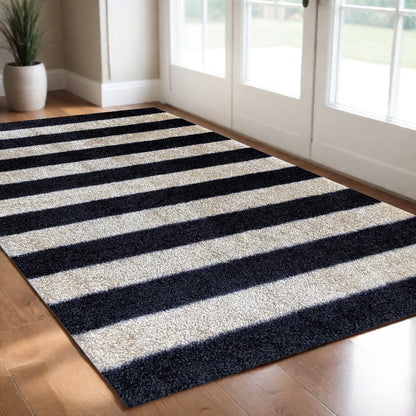 2' X 3' Black and Tan Wide Stripe Washable Floor Mat