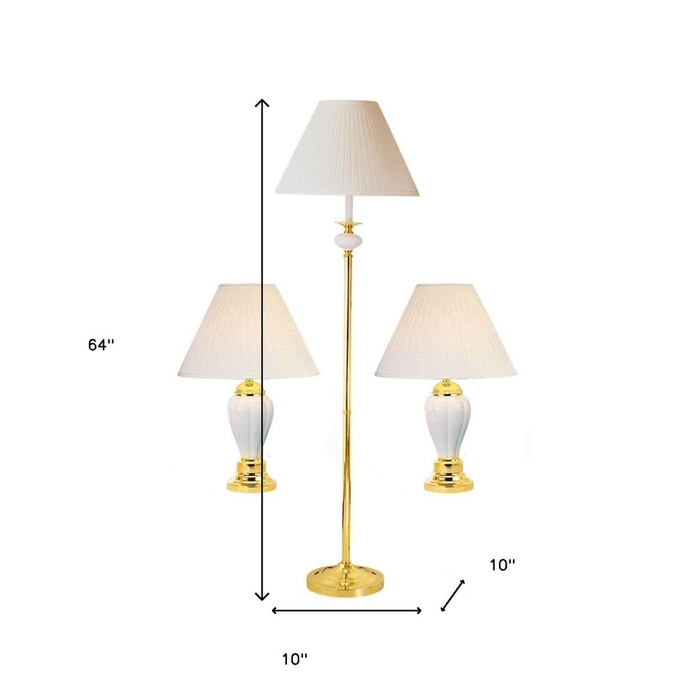 Set Of Three 64" Gold and White Ceramic Bedside Floor and Table Lamp Set With Off White Empire Shade