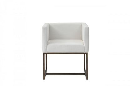 Off White and Antiqued Brass Upholstered Fabric Dining Arm Chair