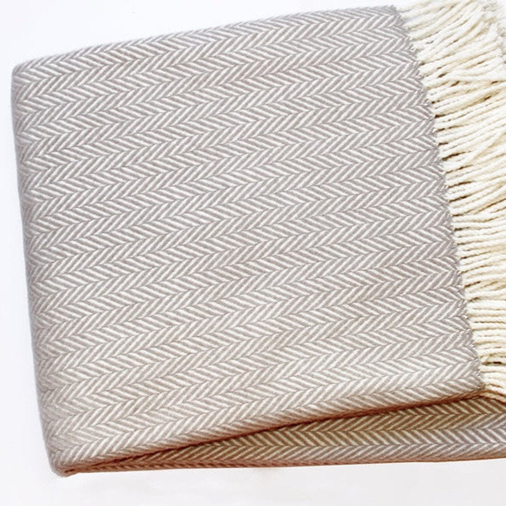 70" X 55" Gray And White Herringbone Cotton Blend Woven Throw Blanket with Tassels