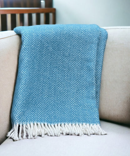 70" X 55" Teal Blue And White Cotton Blend Woven Herringbone Plush Throw Blanket with Tassels