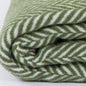 55" X 70" Moss Green And White Cotton Blend Woven Herringbone Plush Throw Blanket with Tassels