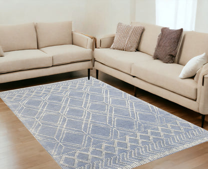 5' X 7' Blue and Ivory Geometric Handmade Area Rug