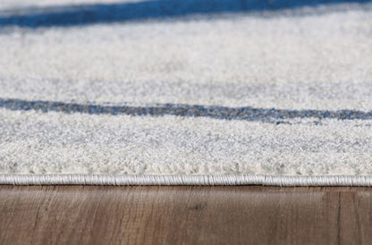5' X 8' Ivory and Blue Abstract Area Rug