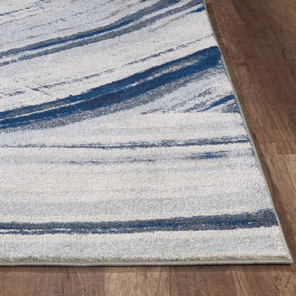 8' X 11' Ivory and Blue Abstract Area Rug