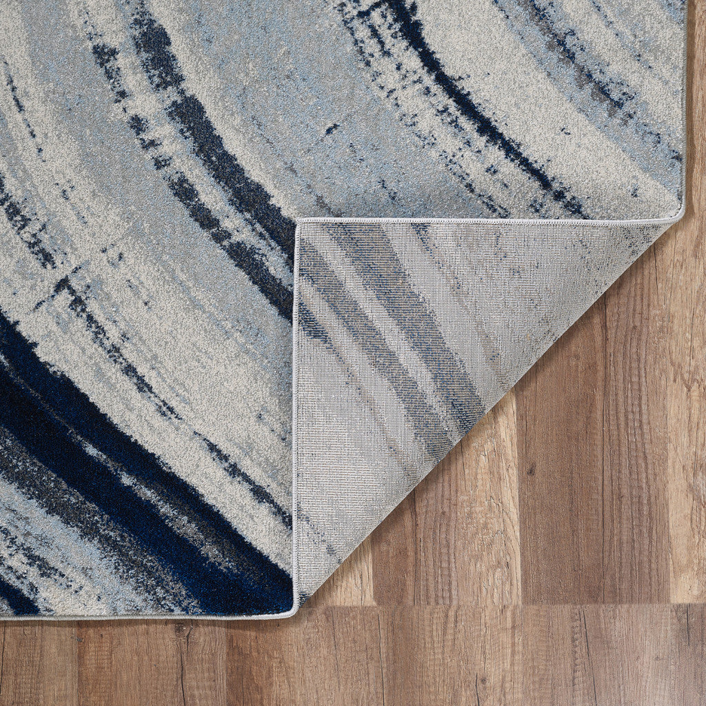 8' X 11' Ivory and Blue Abstract Area Rug