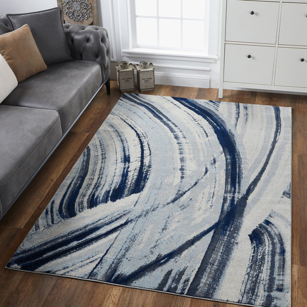 8' X 11' Ivory and Blue Abstract Area Rug