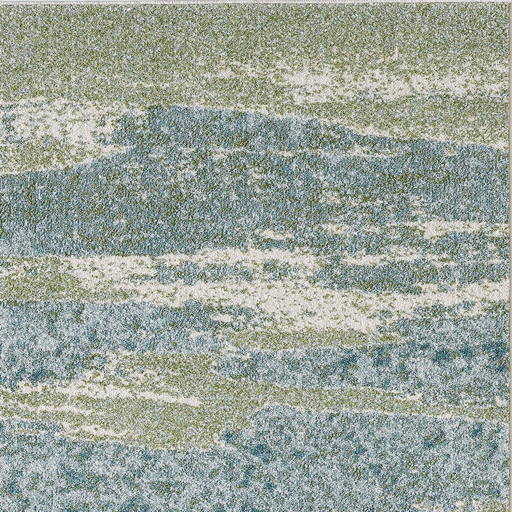 5' X 8' Blue And Green Abstract Area Rug