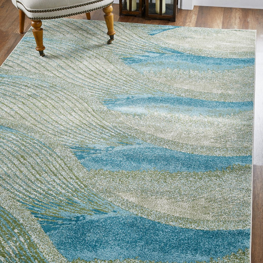 7' X 10' Beige Blue And Sage Abstract Area Rug