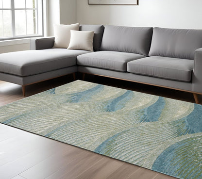 8' X 11' Beige Blue And Sage Abstract Area Rug