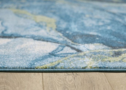 7' X 10' Teal Blue Green And Ivory Abstract Area Rug