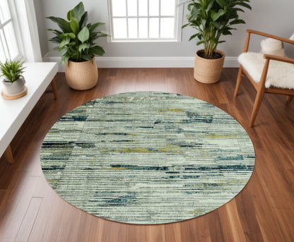 8' Ivory and Blue Round Abstract Area Rug