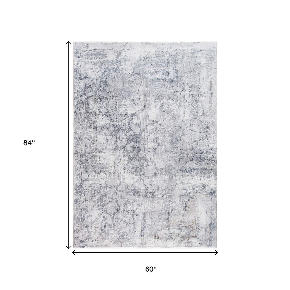 5' X 8' Gray And Ivory Abstract Area Rug
