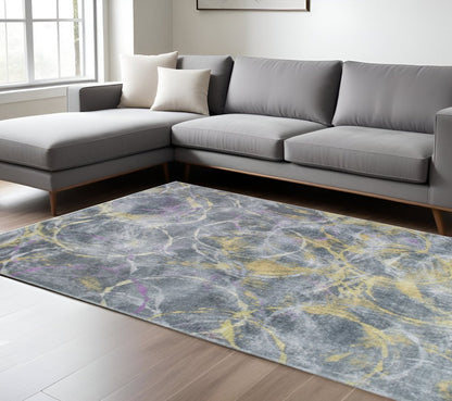6' X 9' Gray Yellow And Purple Abstract Area Rug