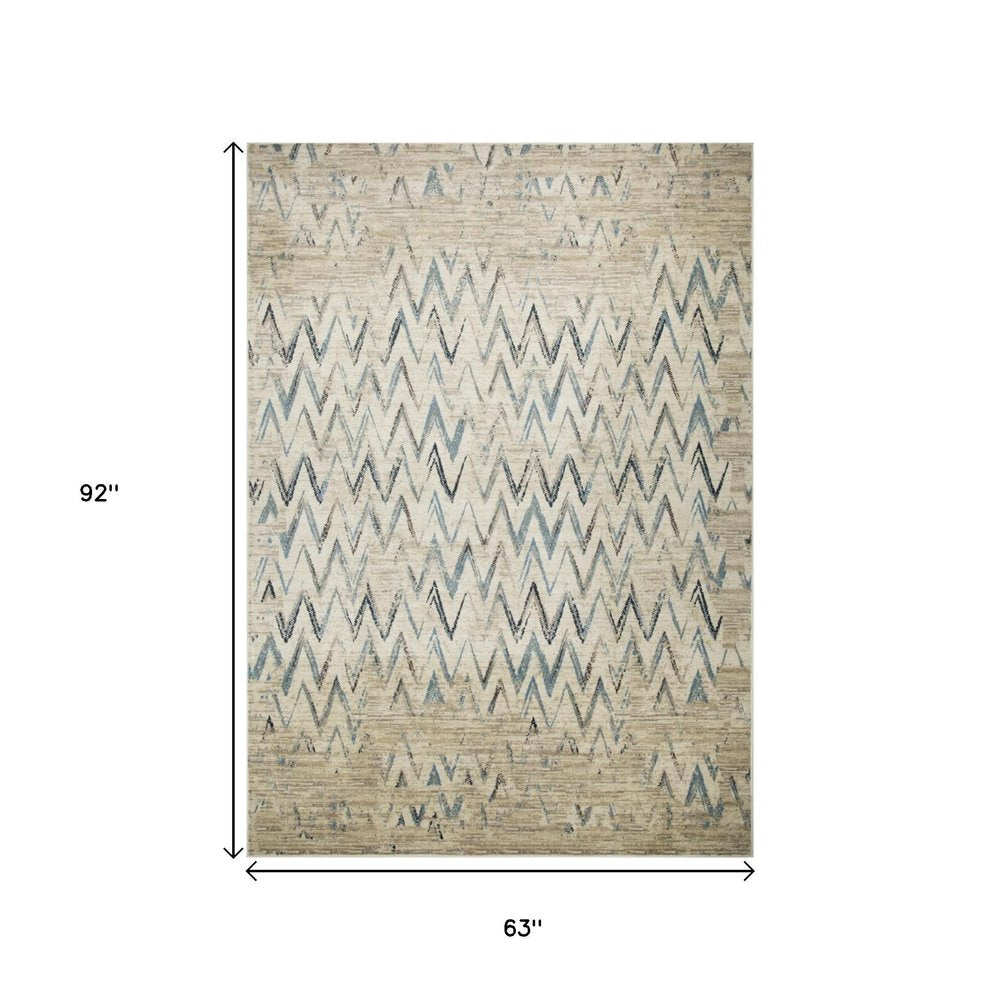 5' X 8' Ivory And Blue Chevron Area Rug