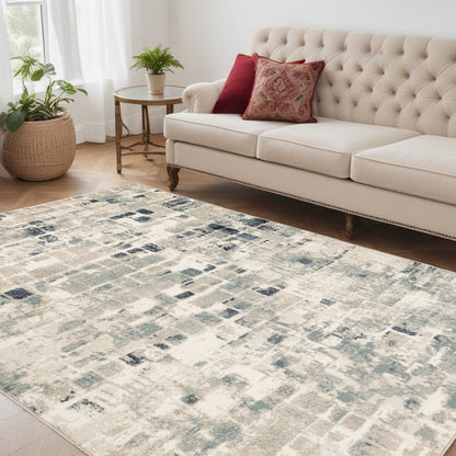 5' X 8' Blue and Beige Abstract Area Rug