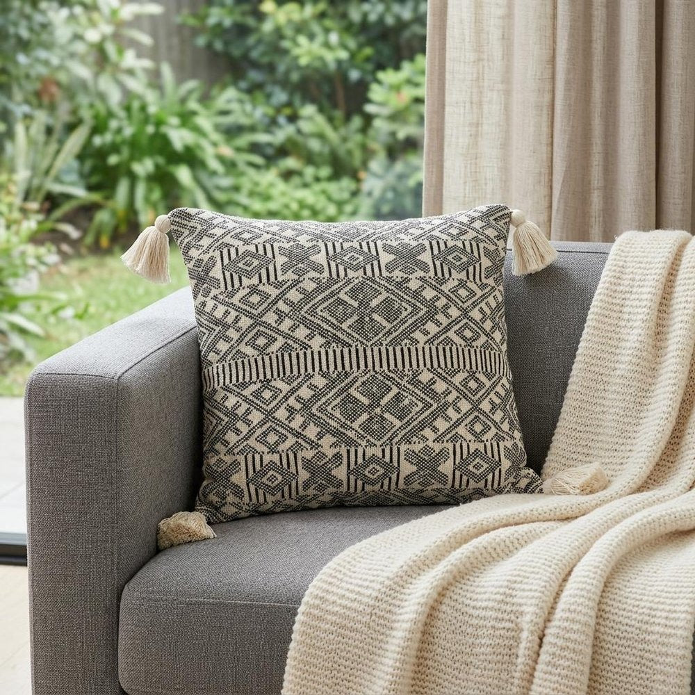 20" x 20" Black and Cream Bohemian Pattern Square Accent Throw Pillow with Tassel