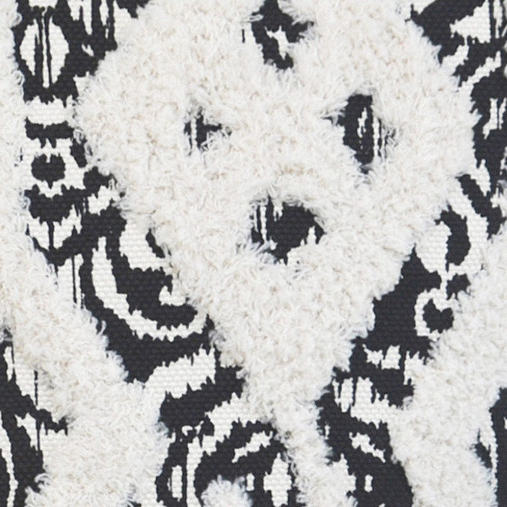 18" Black And White Ikat Cotton Blend Throw Pillow with Tassels