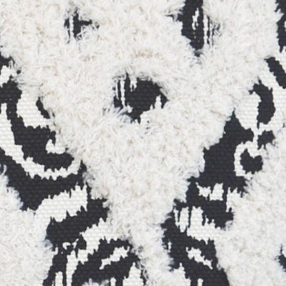 18" Black And White Ikat Cotton Blend Throw Pillow with Tassels