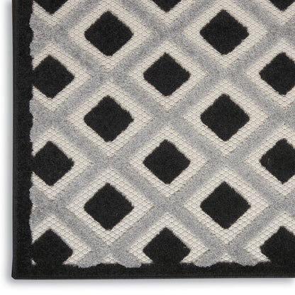 10' Black And White Indoor Outdoor Runner Rug