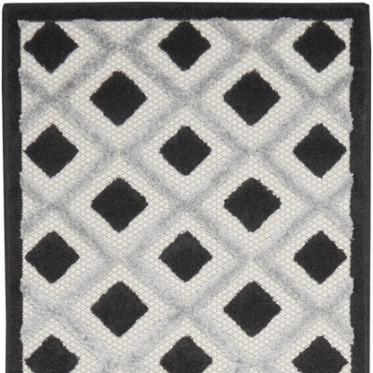 10' Black And White Indoor Outdoor Runner Rug
