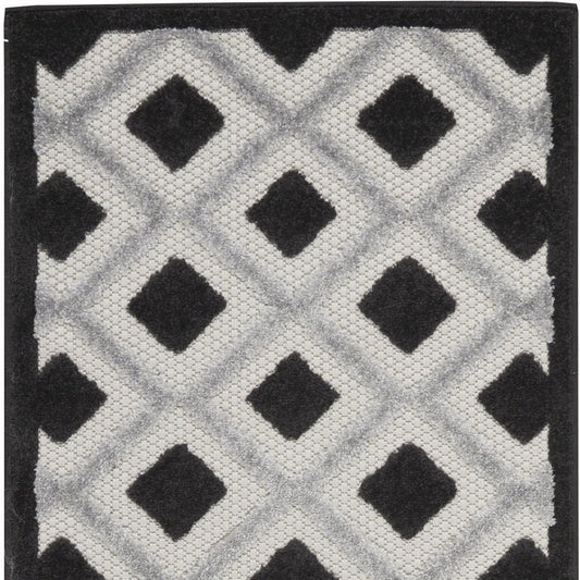8' Black And White Indoor Outdoor Runner Rug